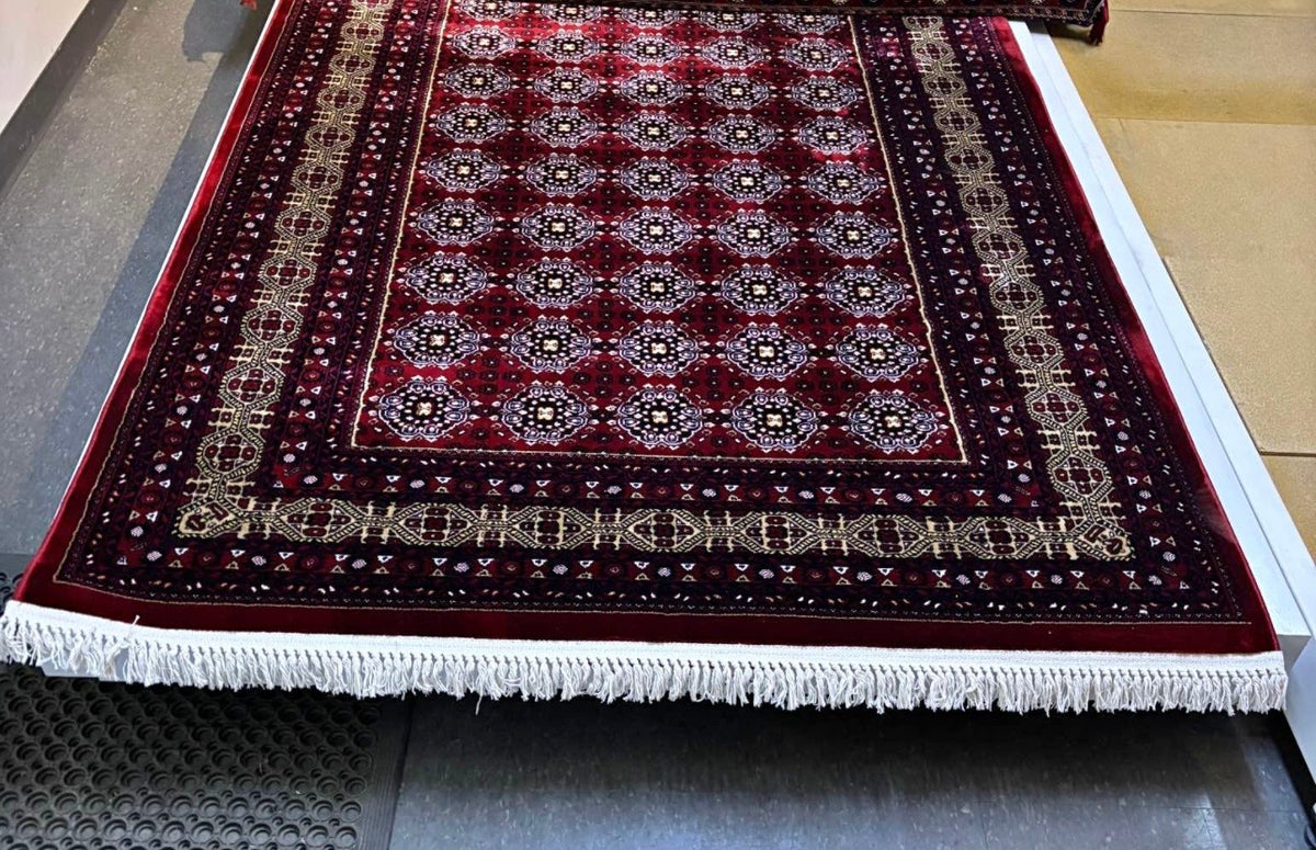 red Afghan floor rug