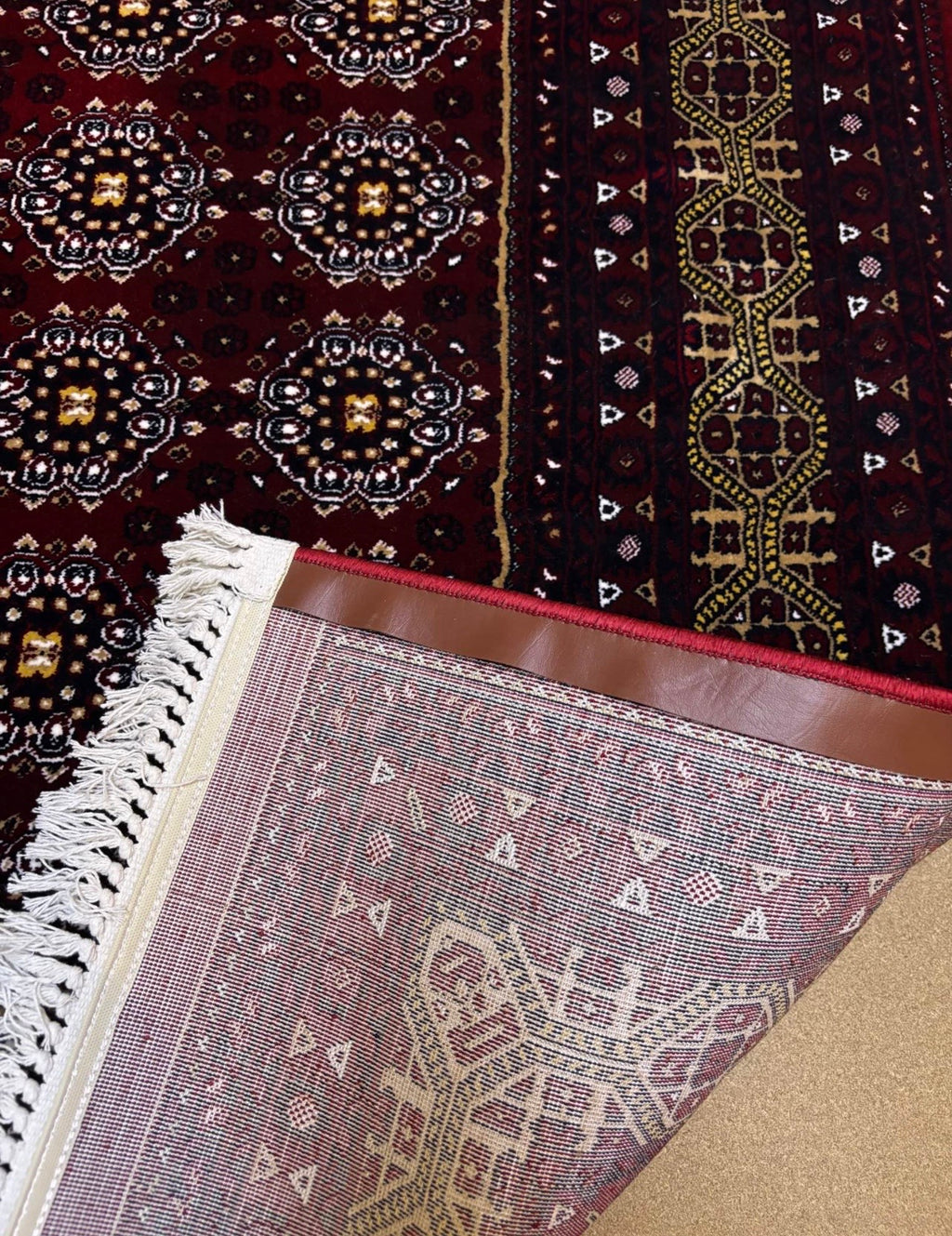 red Afghan floor rug